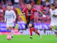 Uros Durdevic (L) of Atlas fights for the ball with Emilio Martinez (R) of Necaxa during the 11th round match between Atlas and Necaxa as part of the Liga BBVA MX, Torneo Apertura 2025 at Jalisco Stadium, on September 27, 2025 in Guadalajara, Jalisco, Mexico.