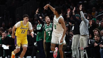 Dec 5, 2025; Boston, Massachusetts, USA; Boston Celtics forward Josh Minott (8) celebrates after making a three point basket against the Los Angeles Lakers during the first half at TD Garden. Mandatory Credit: Winslow Townson-Imagn Images