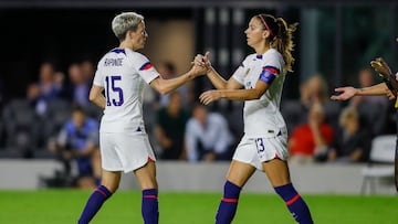 Nov 10, 2022; Ft. Lauderdale, Florida, USA; United States forward Megan Rapinoe (15) celebrates with forward Alex Morgan (13) after scoring during the second half against Germany at DRV PNK Stadium. Mandatory Credit: