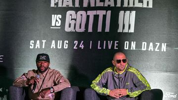 US boxers Floyd Mayweather Jr. (L) and John Gutti III (R) speak during a press conference for their upcoming exhibition fight in Mexico City on August 21, 2024. Mayweather Jr. and Gotti III will face each other in Mexico on August 24, 2024. (Photo by Yuri CORTEZ / AFP)