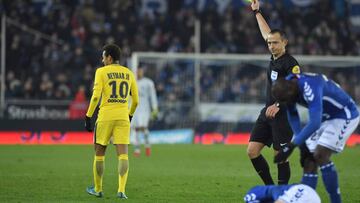 Paris Saint-Germain's Brazilian forward Neymar (L) reacts as French referee Ruddy Buquet gives him a yellow card during the French L1 football match between Strasbourg (RCSA) and Paris Saint-Germain (PSG) at the Meinau Stadium in Strasbourg, eastern France, on December 2, 2017. / AFP PHOTO / Patrick HERTZOG