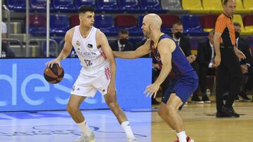 Carlos Aloc&eacute;n y Nick Calathes.