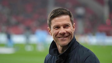 (FILES) Bayer Leverkusen's Spanish head coach Xabi Alonso arrives prior to the German first division Bundesliga football match between Bayer 04 Leverkusen and VfL Bochum in Leverkusen, western Germany on March 28, 2025. Bayer Leverkusen coach Xabi Alonso confirmed on May 9, 2025 he will leave the club at the end of the season, amid reports linking him to Spanish giants Real Madrid. (Photo by Pau BARRENA / AFP) / DFL REGULATIONS PROHIBIT ANY USE OF PHOTOGRAPHS AS IMAGE SEQUENCES AND/OR QUASI-VIDEO