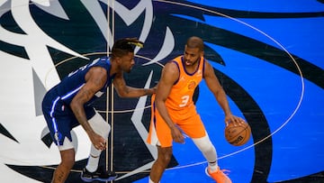 May 8, 2022; Dallas, Texas, USA; Dallas Mavericks forward Reggie Bullock (25) guards Phoenix Suns guard Chris Paul (3) during the first quarter during game four of the second round for the 2022 NBA playoffs at American Airlines Center. Mandatory Credit: Jerome Miron-USA TODAY Sports