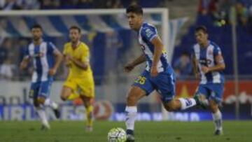 Marco Asensio, conduciendo el balón ante el Sporting.