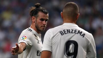 Gareth Bale y Karim Benzema celebran uno de sus goles.