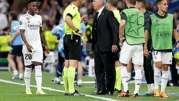 Real Madrid boss Carlo Ancelotti explains his argument with a referee during their UCL clash with Manchester City that got him a yellow card.