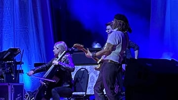 Actor Johnny Depp joins musician Jeff Beck (not pictured) on stage during a concert, in Sheffield, Britain May 29, 2022 in this picture obtained from social media. Peter Herrick/via REUTERS THIS IMAGE HAS BEEN SUPPLIED BY A THIRD PARTY. MANDATORY CREDIT.