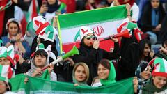 TEHRAN, IRAN - OCTOBER 10: Female football fans show their support ahead of the FIFA World Cup Qualifier match between Iran and Cambodia at Azadi Stadium on October 10, 2019 in Tehran, Iran. (Photo by Amin M. Jamali/Getty Images)