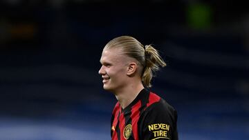 Manchester City's Norwegian striker Erling Haaland reacts during the UEFA Champions League semi-final first leg football match between Real Madrid CF and Manchester City at the Santiago Bernabeu stadium in Madrid on May 9, 2023. (Photo by OSCAR DEL POZO / AFP)