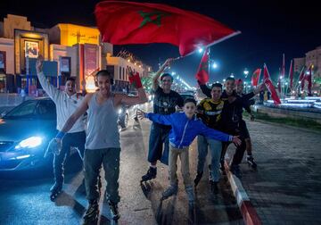 Locals celebrate in Marrakech after Morocco's victory over Ivory Coast in their FIFA 2018 World Cup Play-Off.