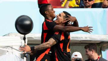 Colombia's forward #11 Jhon Arias (L) celebrates scoring his team's first goal during the international friendly football match between the USA and Colombia at Commanders Field in Greater Landover, Maryland, on June 8, 2024. (Photo by ROBERTO SCHMIDT / AFP)