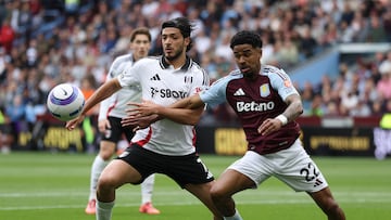 Soccer Football - Premier League - Aston Villa v Fulham - Villa Park, Birmingham, Britain - May 3, 2025 Fulham's Raul Jimenez in action with Aston Villa's Ian Maatsen REUTERS/Ian Walton EDITORIAL USE ONLY. NO USE WITH UNAUTHORIZED AUDIO, VIDEO, DATA, FIXTURE LISTS, CLUB/LEAGUE LOGOS OR 'LIVE' SERVICES. ONLINE IN-MATCH USE LIMITED TO 120 IMAGES, NO VIDEO EMULATION. NO USE IN BETTING, GAMES OR SINGLE CLUB/LEAGUE/PLAYER PUBLICATIONS. PLEASE CONTACT YOUR ACCOUNT REPRESENTATIVE FOR FURTHER DETAILS..
