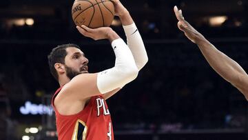 Mar 30, 2018; Cleveland, OH, USA; New Orleans Pelicans forward Nikola Mirotic (3) shoots over the defense of Cleveland Cavaliers forward Jeff Green (32) during the first half at Quicken Loans Arena. Mandatory Credit: Ken Blaze-USA TODAY Sports