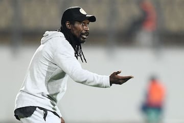 Senegal's head coach Aliou Cisse gestures during the Africa Cup of Nations (CAN) 2021 semi final football match between Burkina Faso and Senegal at Stade Ahmadou-Ahidjo in Yaounde on February 2, 2022. (Photo by CHARLY TRIBALLEAU / AFP)