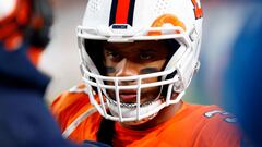 DENVER, COLORADO - DECEMBER 24: Quarterback Russell Wilson #3 of the Denver Broncos talks with coaches during a timeout in the 2nd quarter of the game against the New England Patriots at Empower Field At Mile High on December 24, 2023 in Denver, Colorado.   Justin Edmonds/Getty Images/AFP (Photo by Justin Edmonds / GETTY IMAGES NORTH AMERICA / Getty Images via AFP)