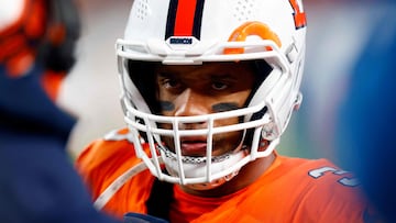 DENVER, COLORADO - DECEMBER 24: Quarterback Russell Wilson #3 of the Denver Broncos talks with coaches during a timeout in the 2nd quarter of the game against the New England Patriots at Empower Field At Mile High on December 24, 2023 in Denver, Colorado.   Justin Edmonds/Getty Images/AFP (Photo by Justin Edmonds / GETTY IMAGES NORTH AMERICA / Getty Images via AFP)