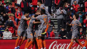 MALLORCA, SPAIN - FEBRUARY 26: Gabriel Paulista of Valencia CF celebrates scoring his team's first goal with teammates during the LaLiga Santander match between RCD Mallorca and Valencia CF at Estadio de Son Moix on February 26, 2022 in Mallorca, Spa