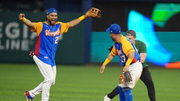 MIAMI, FLORIDA - MARCH 11: Anthony Santander #25 of Venezuela celebrates with Jose Altuve #27 after defeating the Dominican Republic at loanDepot park on March 11, 2023 in Miami, Florida.   Eric Espada/Getty Images/AFP (Photo by Eric Espada / GETTY IMAGES NORTH AMERICA / Getty Images via AFP)