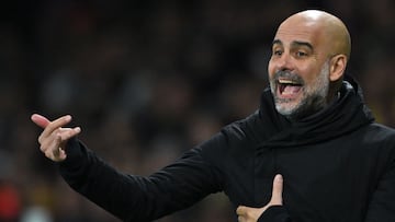 Manchester City's Spanish head coach Pep Guardiola reacts during the UEFA Champions League Group G football match between Young Boys (SUI) and Manchester City (ENG) at The Wankdorf Stadium, in Bern on October 25, 2023. (Photo by Fabrice COFFRINI / AFP)