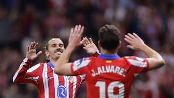 Atletico Madrid's Argentine forward #19 Julian Alvarez celebrates with Atletico Madrid's French forward #07 Antoine Griezmann scoring his team's third goal during the Spanish league football match between Club Atletico de Madrid and Rayo Vallecano de Madrid at the Metropolitano Stadium in Madrid, on April 24, 2025. (Photo by OSCAR DEL POZO / AFP)