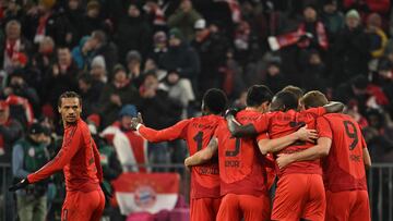 Bayern Munich's players celebrate after scoring the 3-1 goal during the German first division Bundesliga football match between FC Bayern Munich and VfL Wolfsburg in Munich, southern Germany, on January 18, 2025. (Photo by LUKAS BARTH-TUTTAS / AFP) / DFL REGULATIONS PROHIBIT ANY USE OF PHOTOGRAPHS AS IMAGE SEQUENCES AND/OR QUASI-VIDEO