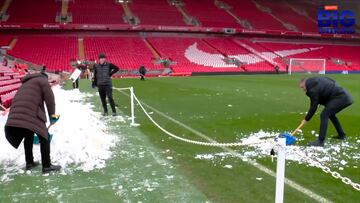 Gary Neville shoveling snow onto pitch to ‘sabotage’ Liverpool vs. Manchester United match