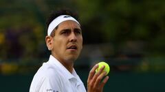 Tennis - Wimbledon - All England Lawn Tennis and Croquet Club, London, Britain - July 4, 2024 Chile's Alejandro Tabilo reacts during his second round match against Italy's Flavio Cobolli REUTERS/Hannah Mckay