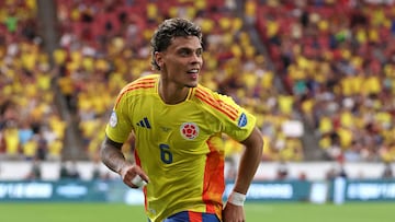 Colombia's midfielder #06 Richard Rios celebrates scoring his team's fourth goal during the Conmebol 2024 Copa America tournament quarter-final football match between Colombia and Panama at State Farm Stadium in Glendale, Arizona, on July 6, 2024. (Photo by Chris CODUTO / AFP)
