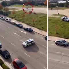 El 'vacile' de un ciclista a un coche de la Policía Municipal en Madrid