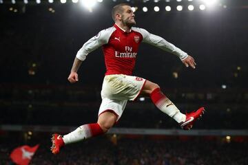 Jack Wilshere of Arsenal celebrates after scoring his sides first goal during the Premier League match against Chelsea.