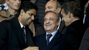 REFILE - CORRECTING ID OF MAN IN CENTRENasser Al-Khelaifi (L), Paris Saint Germain's club owner and owner of Qatari TV channel Al Jazeera Sport, President of beIN Sport French TV channel, speaks with former French President Nicolas Sarkozy (R) and Re