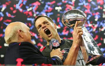 Tom Brady #12 of the New England Patriots holds the Vince Lombardi Trophy after defeating the Atlanta Falcons 34-28 in overtime during Super Bowl 51 at NRG Stadium on February 5, 2017 in Houston, Texas.