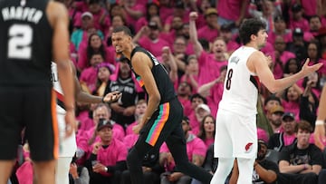 San Antonio Spurs forward Victor Wembanyama (1) reacts after drawing a foul while scoring a basket during the second half of game one of the first round of the 2026 NBA Playoffs against the Portland Trail Blazers at Frost Bank Center.