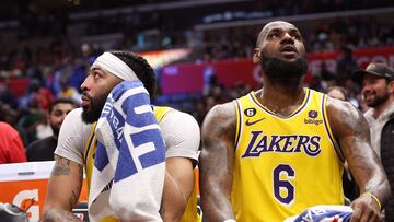 LOS ANGELES, CALIFORNIA - APRIL 05: Anthony Davis #3 and LeBron James #6 of the Los Angeles Lakers react from the bench during a 125-118 LA Clippers win at Crypto.com Arena on April 05, 2023 in Los Angeles, California. NOTE TO USER: User expressly acknowledges and agrees that, by downloading and or using this photograph, User is consenting to the terms and conditions of the Getty Images License Agreement.   Harry How/Getty Images/AFP (Photo by Harry How / GETTY IMAGES NORTH AMERICA / Getty Images via AFP)