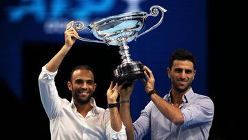 LONDON, ENGLAND - NOVEMBER 14: Juan Sebastian Cabal and Robert Farah of Colombia pose with their trophy after being announced as doubles world number one the during Day Five of the Nitto ATP World Tour Finals at The O2 Arena on November 14, 2019 in London, England. (Photo by James Chance/Getty Images)