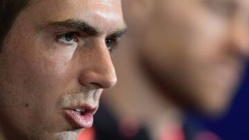 (FILES) This file photo taken on April 26, 2016 shows Bayern Munich's midfielder Philipp Lahm speaking during a press conference at the Vicente Calderon stadium in Madrid on the eve of their UEFA Champions League semi-final first leg football match Club Atletico de Madrid vs Bayern Munich.
Germany's World Cup winning captain Philipp Lahm confirmed on February 08, 2017, he will retire at the end of the season and leave Bayern Munich, having rejected a role as sports director. / AFP PHOTO / JAVIER SORIANO