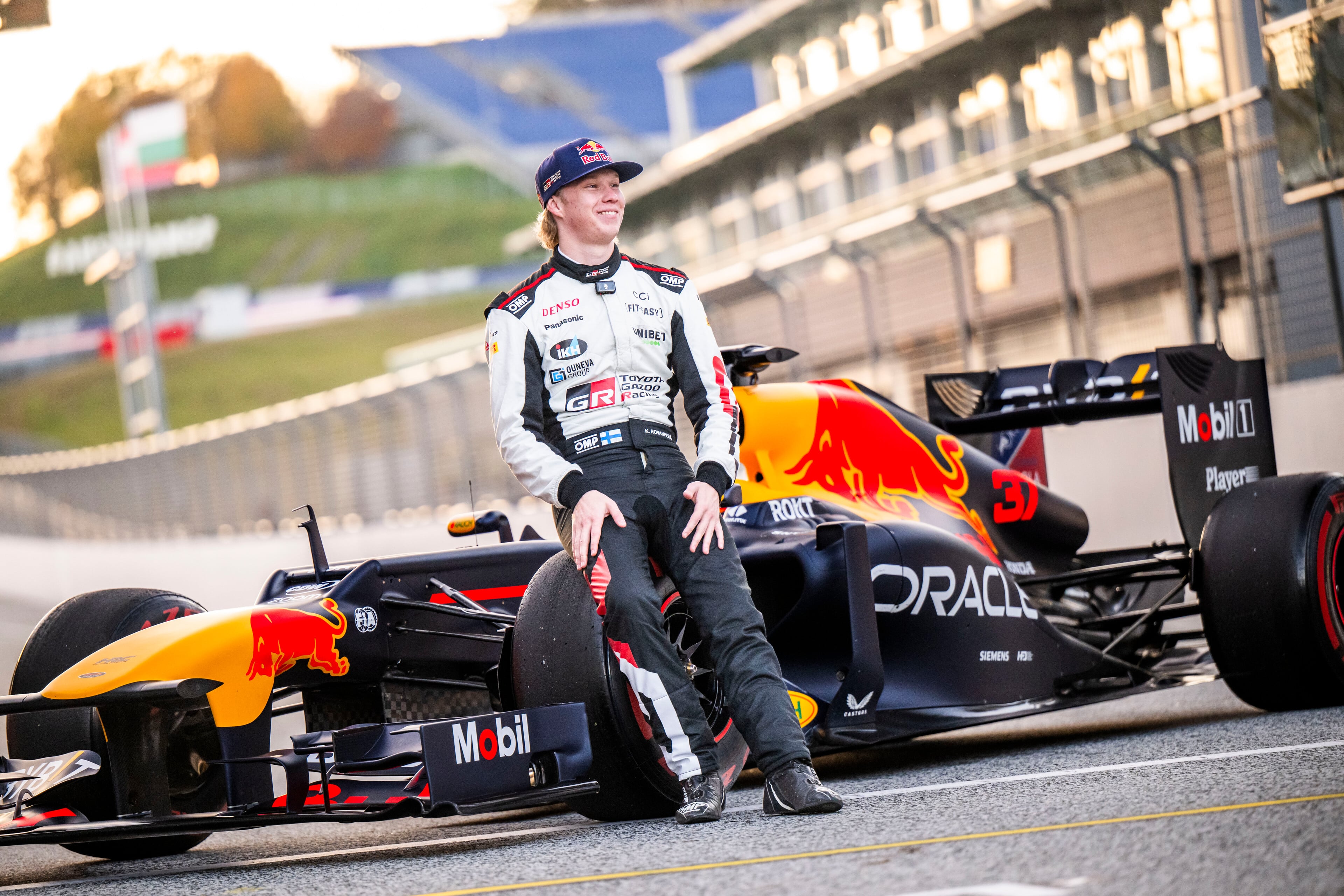 Kalle Rovanperä posing in front of the Red Bull Racing Formula car at the Red Bull Ring, in Austria, on November 1.  // Michael Jurtin / Red Bull Content Pool // SI202411060173 // Usage for editorial use only // 