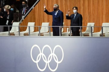 TOKYO, JAPAN - JULY 23: President of the International Olympic Committee (IOC) Thomas Bach (L) and Japan's Emperor Naruhito wave during the Opening Ceremony of the Tokyo 2020 Olympic Games at Olympic Stadium on July 23, 2021 in Tokyo, Japan. (Photo by Lu 
