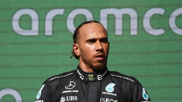 AUSTIN, TEXAS - OCTOBER 23: Second placed Lewis Hamilton of Great Britain and Mercedes celebrates on the podium following the F1 Grand Prix of USA at Circuit of The Americas on October 23, 2022 in Austin, Texas. Chris Graythen/Getty Images/AFP