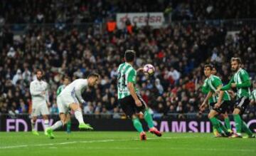 MADRID, SPAIN - MARCH 12:  Cristiano Ronaldo of Real Madrid scores Real's opening goal during the La Liga match between Real Madrid CF and Real Betis Balompie at Estadio Santiago Bernabeu on March 12, 2017 in Madrid, Spain.  (Photo by Denis Doyle/Getty Im