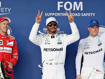 AUSTIN, TX - OCTOBER 21: Top three qualifiers Lewis Hamilton of Great Britain and Mercedes GP, Sebastian Vettel of Germany and Ferrari and Valtteri Bottas of Finland and Mercedes GP in parc ferme during qualifying for the United States Formula One Grand Prix at Circuit of The Americas on October 21, 2017 in Austin, Texas.   Will Taylor-Medhurst/Getty Images/AFP
 == FOR NEWSPAPERS, INTERNET, TELCOS &amp; TELEVISION USE ONLY ==