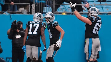 Nov 30, 2025; Charlotte, North Carolina, USA; Carolina Panthers wide receiver Tetairoa McMillan (4) celebrates with Carolina Panthers wide receiver Xavier Legette (17) after scoring a touchdown during the fourth quarter against the Los Angeles Rams at Bank of America Stadium. Mandatory Credit: Scott Kinser-Imagn Images
