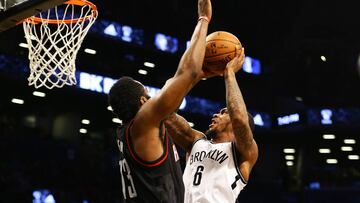 Jan 15, 2017; Brooklyn, NY, USA; Brooklyn Nets guard Sean Kilpatrick (6) goes up for a shot against Houston Rockets guard James Harden (13) during the second half at Barclays Center. The Rockets won 137-112. Mandatory Credit: Andy Marlin-USA TODAY Sports