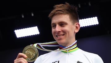 Cycling - Road World Championships 2025 - Kigali, Rwanda - September 28, 2025 Slovenia's Tadej Pogacar celebrates on the podium after winning the Men's Elite Road Race REUTERS/Jean Bizimana