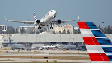 American Airlines flight 718, the first U.S. Boeing 737 MAX commercial flight since regulators lifted a 20-month grounding in November, takes off from Miami, Florida, U.S. December 29, 2020.  REUTERS/Marco Bello