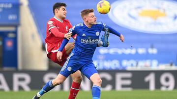 LEICESTER, ENGLAND - FEBRUARY 13: Harvey Barnes of Leicester City and Ozan Kabak of Liverpool battle for possession during the Premier League match between Leicester City and Liverpool at The King Power Stadium on February 13, 2021 in Leicester, England.