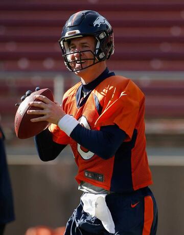 Peyton Manning #18 of the Denver Broncos looks to pass the ball during practice at Stanford Stadium on February 4, 2016 in Stanford, California. The Broncos will play the Carolina Panthers in Super Bowl 50 on February 7, 2016.