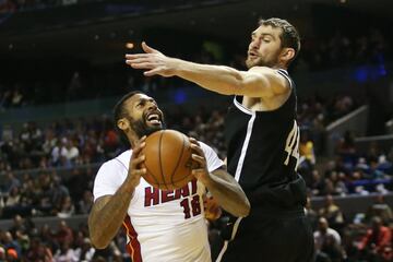 Basketball - NBA Global Games - Brooklyn Nets v Miami Heat - Arena Mexico, Mexico City, Mexico December 9, 2017. James Johnson of Miami Heat and Tyler Zeller of Brooklyn Nets in action. REUTERS/Edgard Garrido