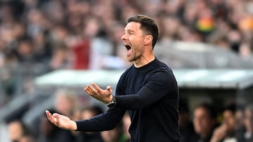 Soccer Football - Bundesliga - St. Pauli v Bayer Leverkusen - Millerntor-Stadion, Hamburg, Germany - April 20, 2025 Bayer Leverkusen coach Xabi Alonso reacts REUTERS/Carmen Jaspersen DFL REGULATIONS PROHIBIT ANY USE OF PHOTOGRAPHS AS IMAGE SEQUENCES AND/OR QUASI-VIDEO.